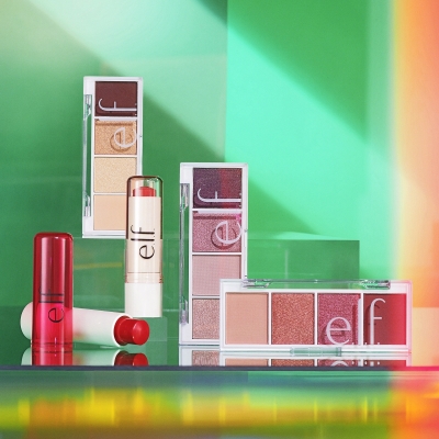Stil life of Holiday Gifts under  - Candy Kisses Lip Balm Duo (70910) in Bare Kiss & XO Re with Bite Size Eyeshadow in Cream & Sugar, Berry Bad, & Rose Water.