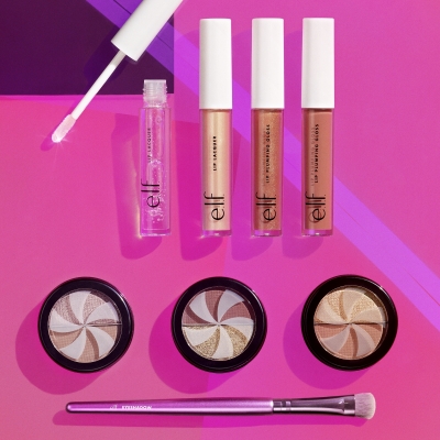 Still life of Holiday Gifts under  - Candy Coated Lip Set (70922) & A Sight for Sweet Eyes (70926)
