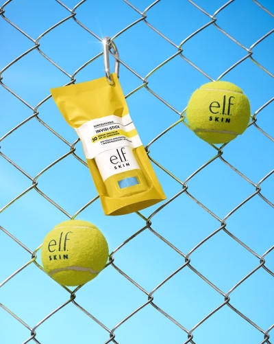 Invisi-stick SPF 50 in bag on fence (57505)