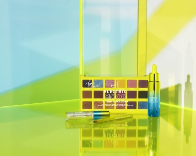 Still Life of Tiana Major9 Lip Duo Gloss (82571), Feeling Lucky 18pc Eyeshadow Palette (82570), and Iluminating Elixir Scorpio Glow (82572)